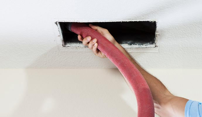 Expert cleaning air ducts.