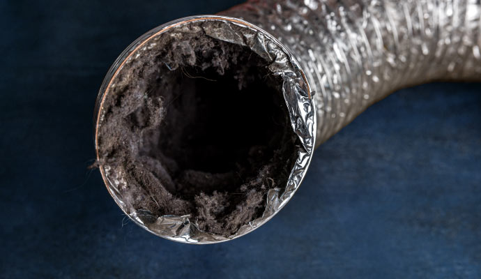 Visible dust on a dryer vent