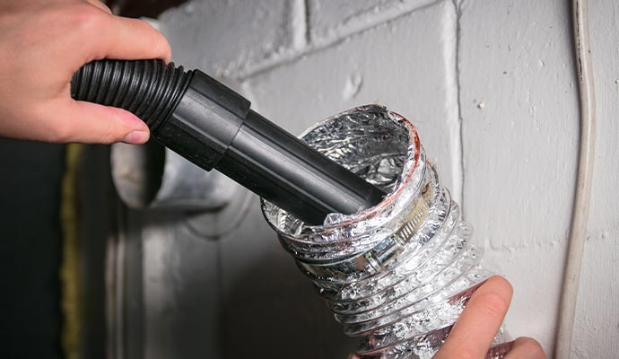 Dryer vent cleaning with vacuum cleaner